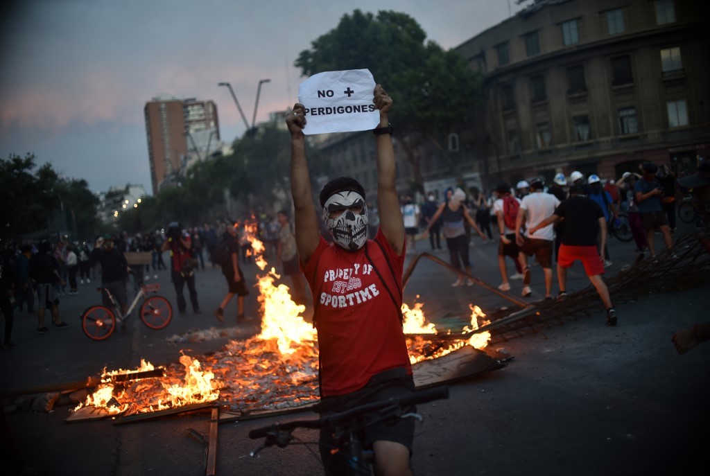Huelga general mide fuerza con Piñera en cuarta semana de protestas en Chile