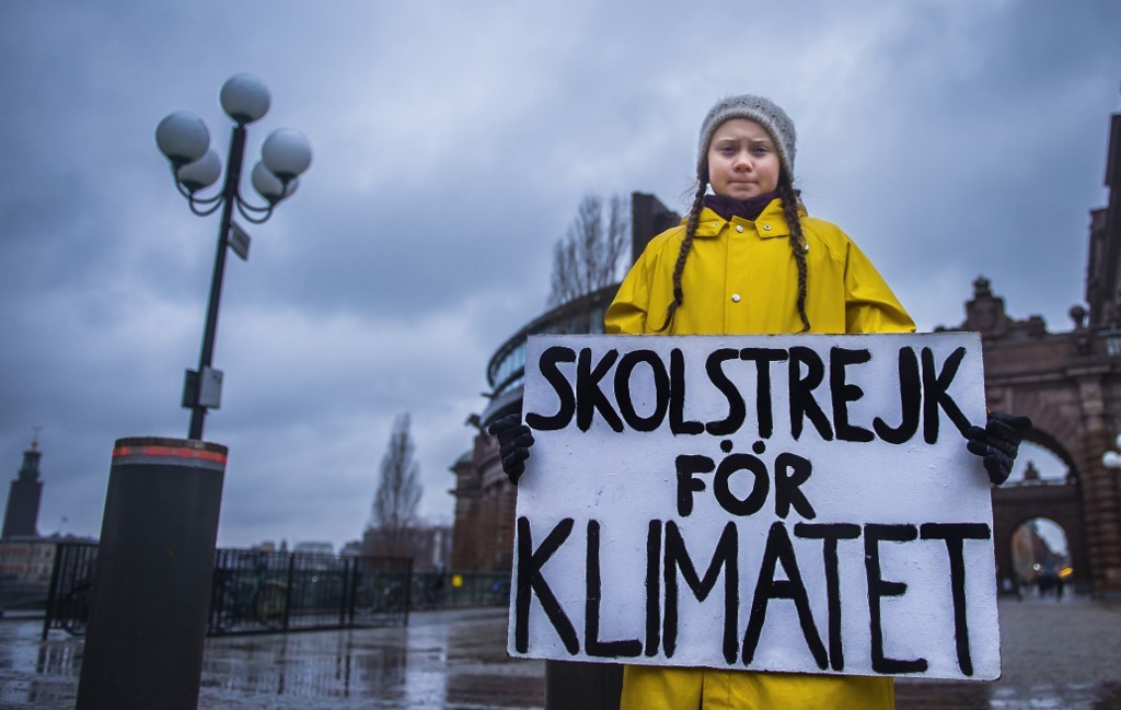 Greta Thunberg, la desafiante chica de trenzas y el abrigo amarillo