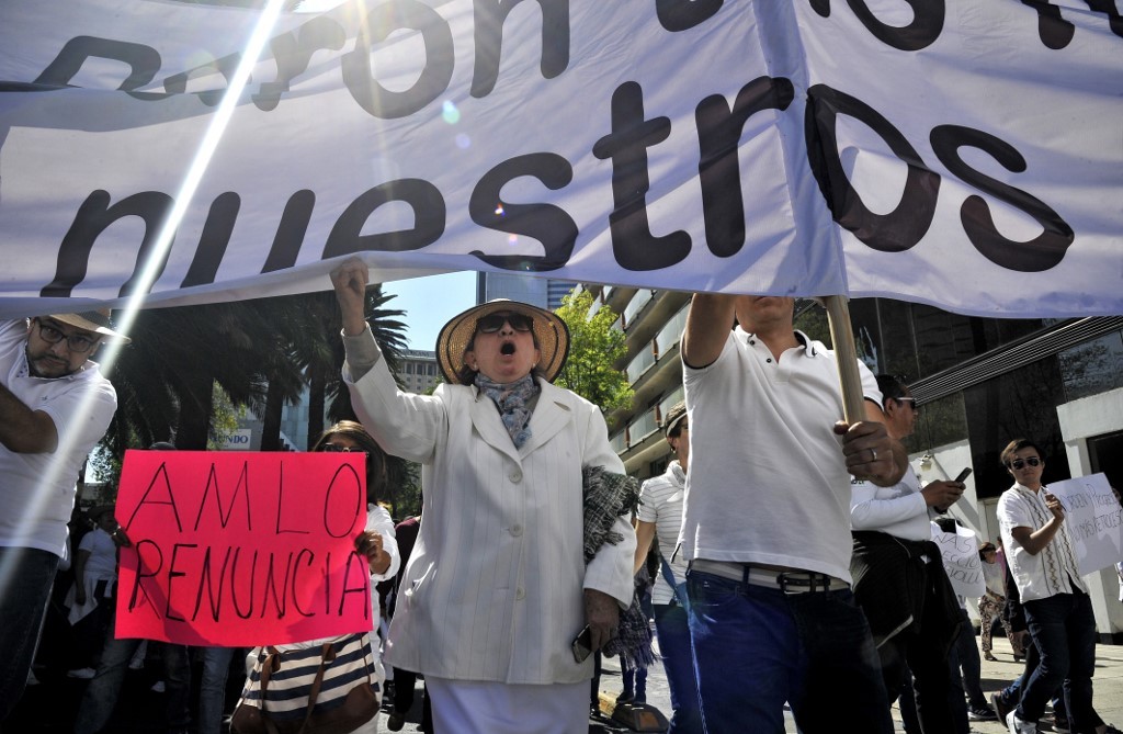 Protestas y celebraciones en primer año de gobierno de López Obrador en México